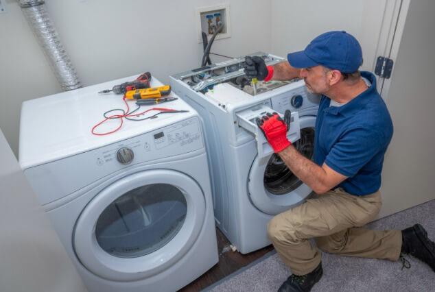 professional repairing home kitchen appliance in Rye Brook, NY
